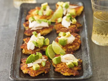 Potato cakes with smoked fish and avocado