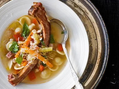 Barley and smoked pork soup with pasta