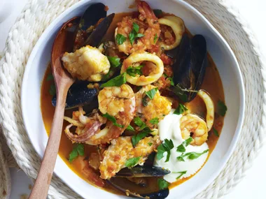 Spanish seafood stew with aioli