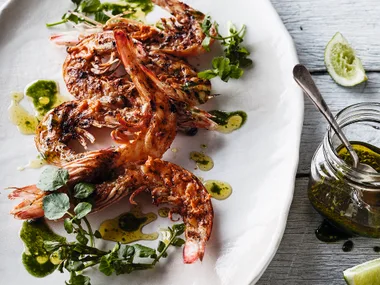 Grilled king prawns with Bloody Mary butter and green oil