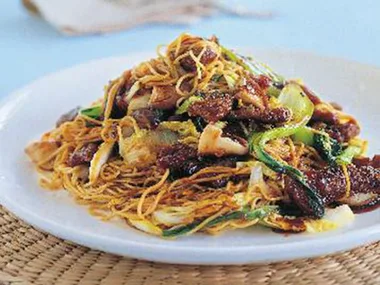Crisp beef with baby bok choy and noodles
