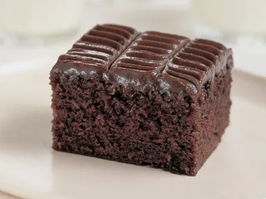 Family chocolate cake with fudge frosting