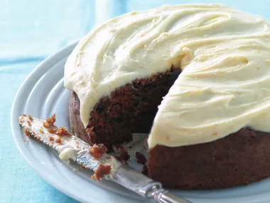 Gluten-free carrot cake with orange frosting