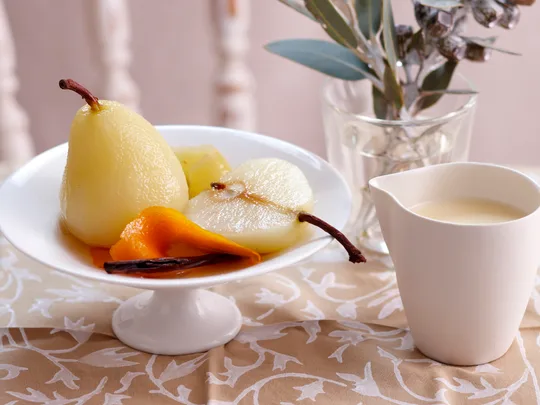 Champagne poached pears with creme anglaise
