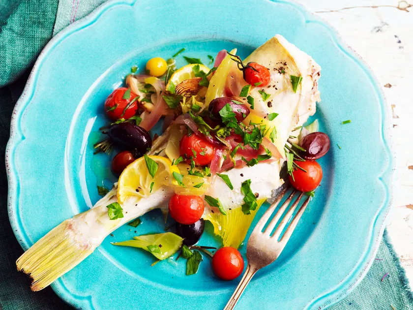Oven-baked fish with tomato and olives