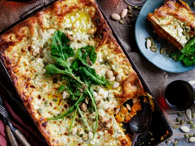 Pumpkin and goat’s cheese lasagne with rocket and pepita