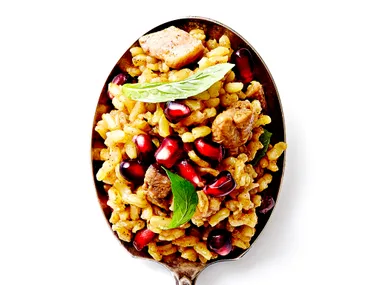 Brown rice, pomegranate and chicken pilaf