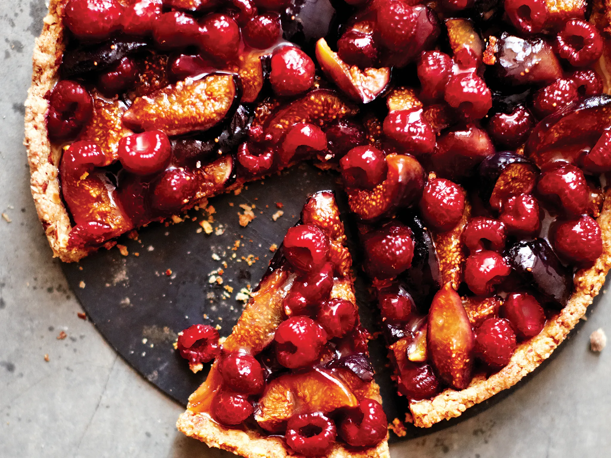 Roasted fig raspberry tart with toasted almond crust