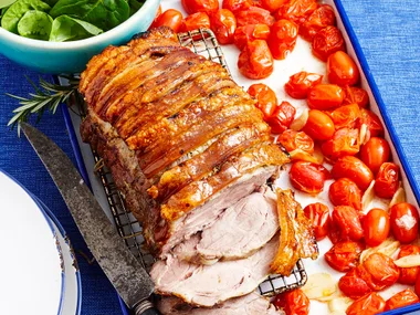 Slow roasted pork neck with garlic tomatoes