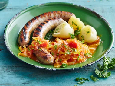 Spiced tomato and onion with grilled sausages