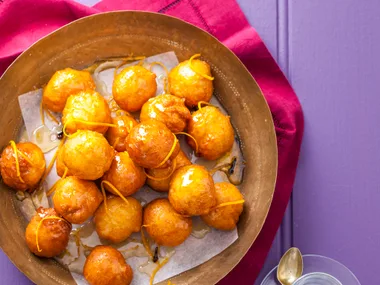 Doughnuts with orange honey syrup