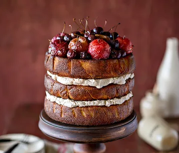 Stone fruit gâteau with cinnamon cream and roasted fruit topping
