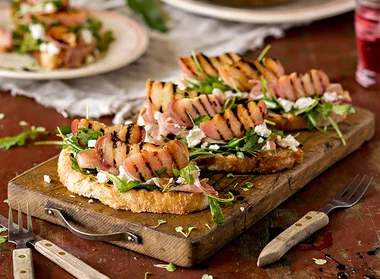 Grilled peach and prosciutto bruschetta