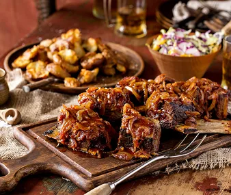 Sticky beef short ribs, smashed spuds and harvest slaw