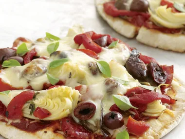 Salami, tomato and olive mini pizza