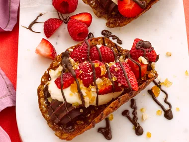 Chocolate tacos with cream and berries