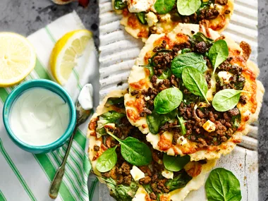 Spicy lamb, spinach and feta pizzas