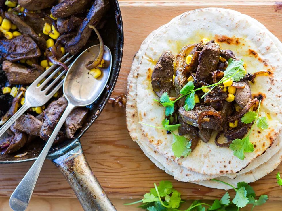 Spiced lamb liver on pita bread