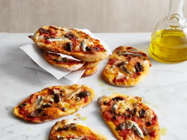 Puttanesca pizzettas
