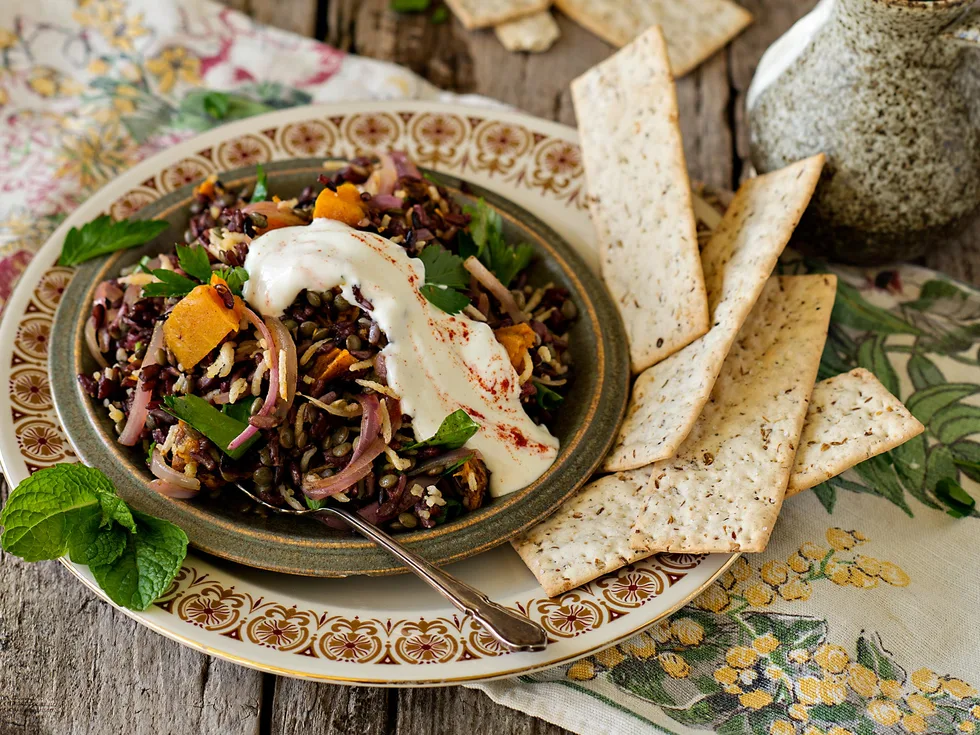 Lentil and rice salad with fried onions and yoghurt dressing