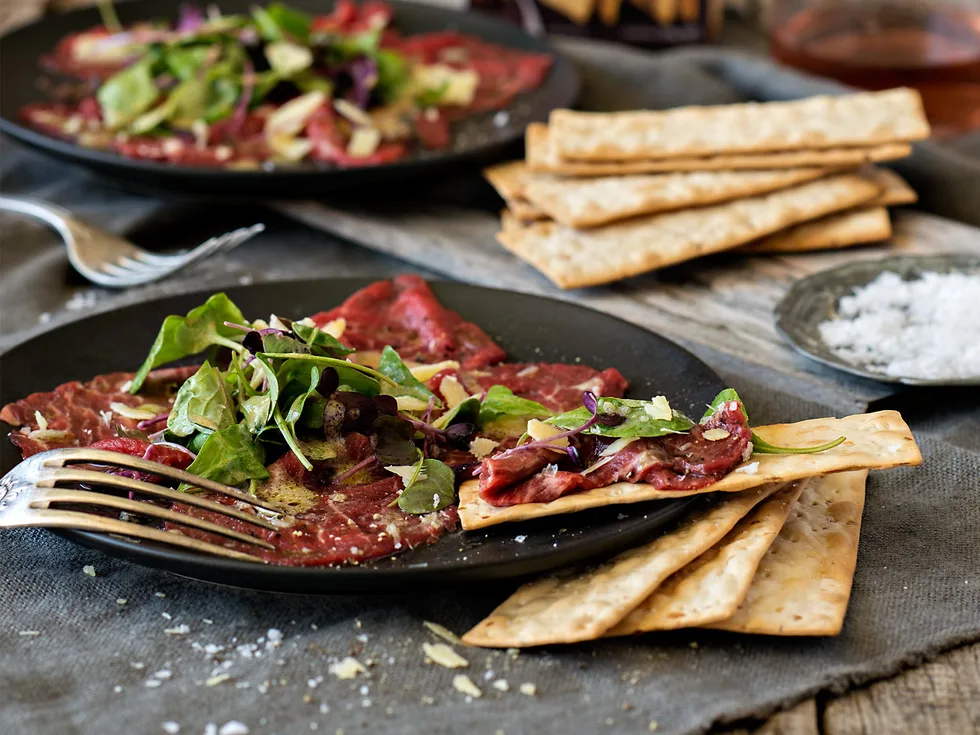 Summer beef carpaccio with marinated microgreens