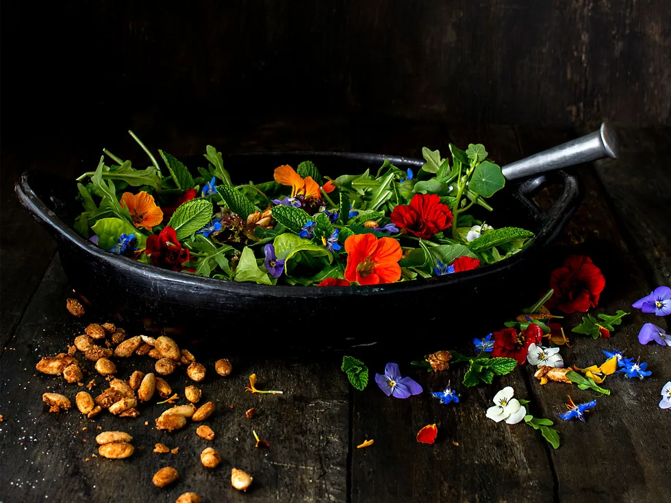 Leafy salad with spiced almonds & frida flowers
