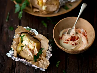 Bonfire spuds with paprika cream