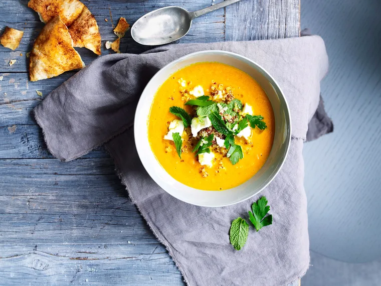 Carrot soup with feta and quinoa