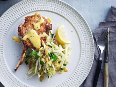 Veal cutlets with warm cabbage and celeriac slaw