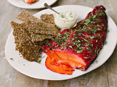 Beetroot-cured salmon gravlax with seed bark