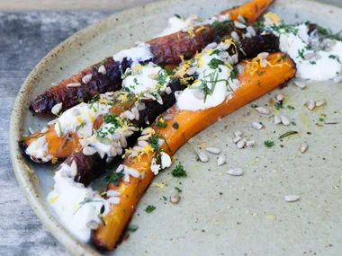 Charred carrots with milk curds, mint and sunflower seeds