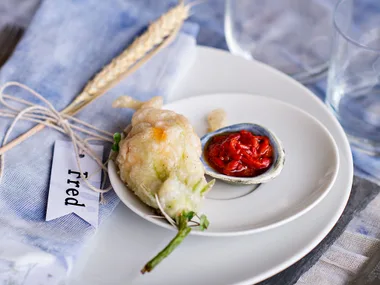 Stuffed courgette flowrs with summer herbs