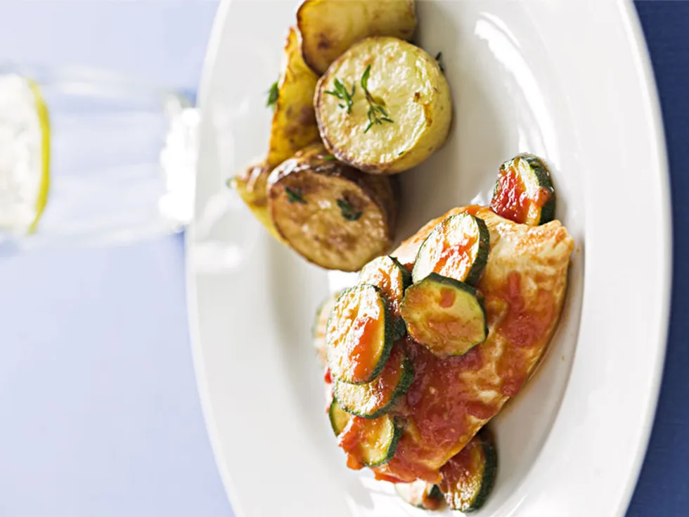 Chicken baked with courgettes and pan-roasted thyme potatoes
