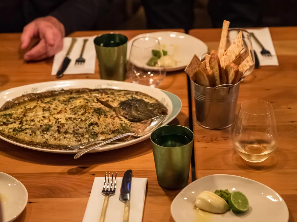 Roasted turbot with wasabi custard and olive and lime tapenade