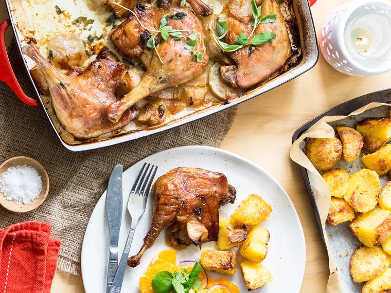 Roasted duck legs with apples & crispy potatoes
