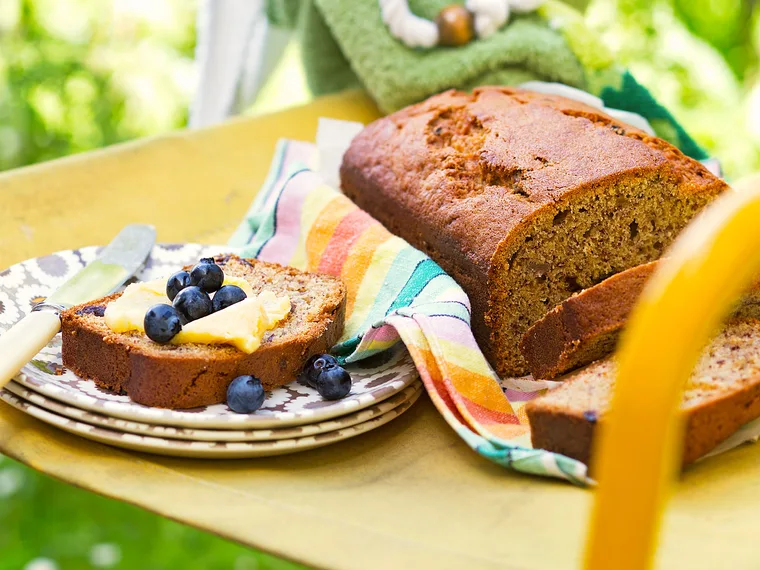Banana bread with honey butter & blueberries