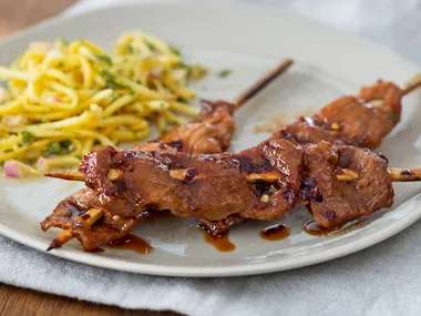 Barbecued Pinoy pork with green mango slaw