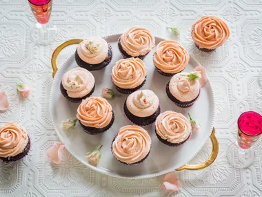 Tim Tam cupcakes with strawberry champagne frosting