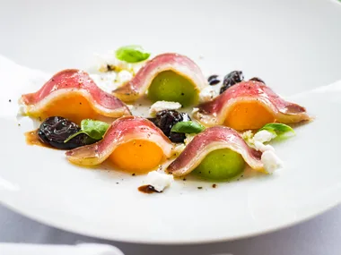 Duck prosciutto & melon with goat's cheese & muscatels