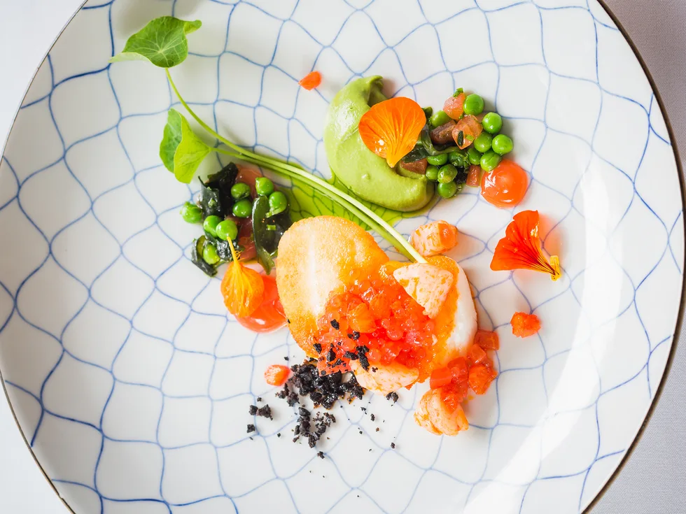 Roasted hapuku with prawns, peas & blood orange