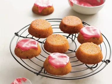 Gluten-free passionfruit cakes with raspberry icing