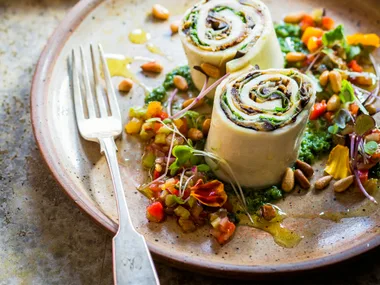 Sfoglia di mozzarella, eggplant and prosciutto roll with capsicum salsa and chilli basil dressing