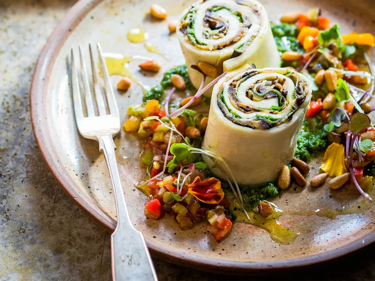Sfoglia di mozzarella, eggplant and prosciutto roll with capsicum salsa and chilli basil dressing
