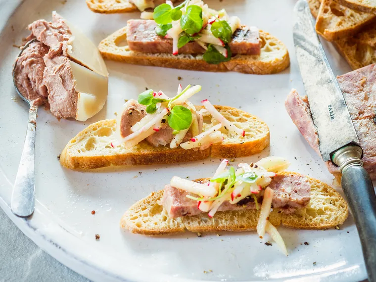 Crostini of chicken and duck parfait, or pork and prune terrine, with apple radish slaw
