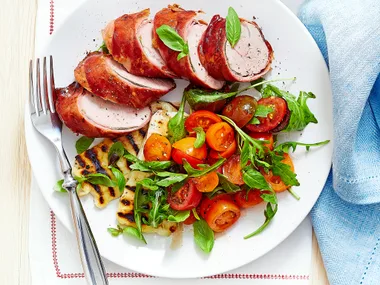 Prosciutto pork with haloumi and tomato salad