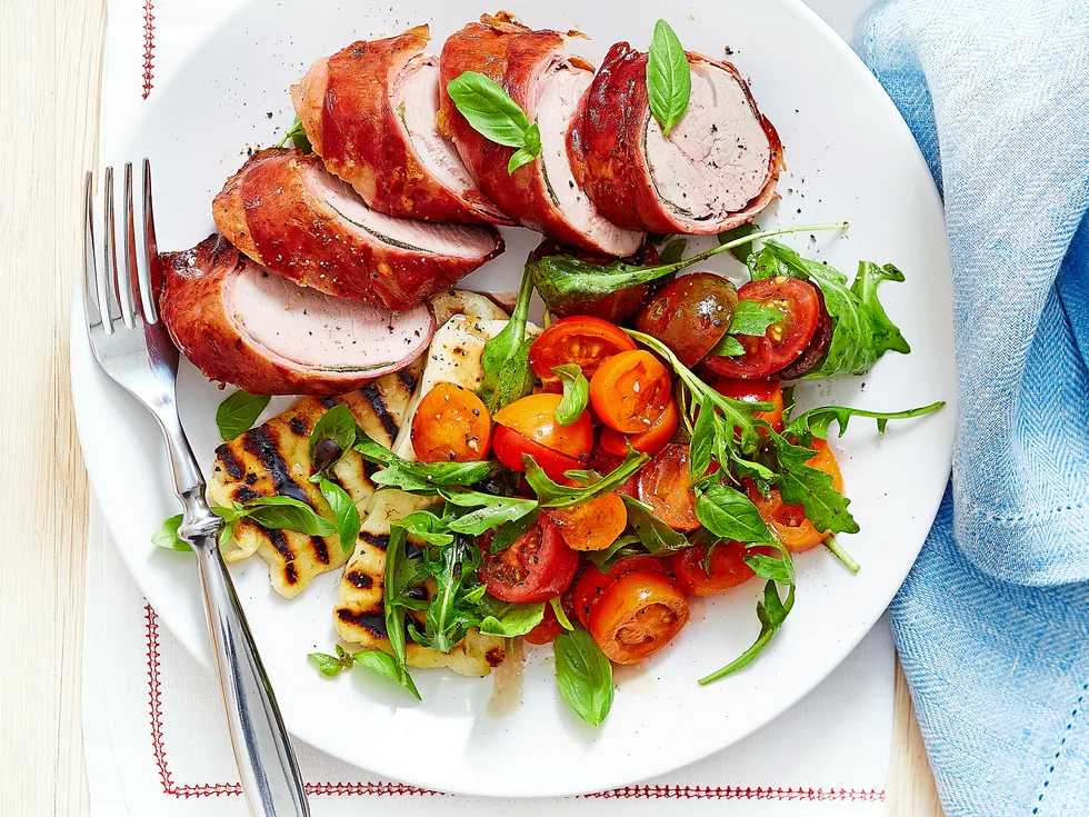 Prosciutto pork with haloumi and tomato salad