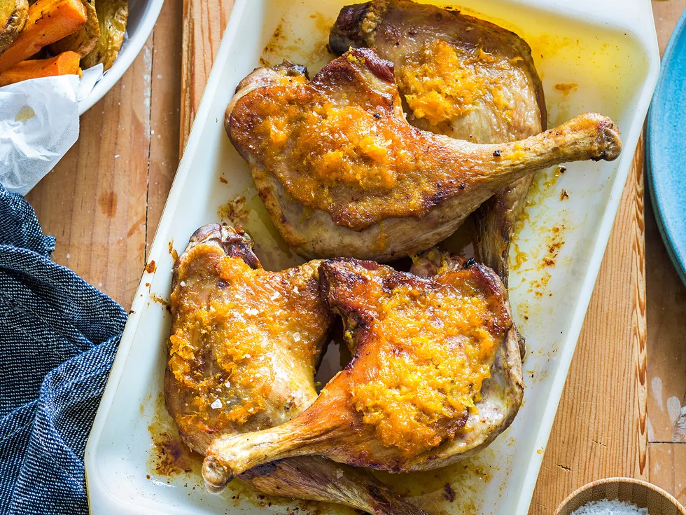 Citrus duck legs and crispy potatoes