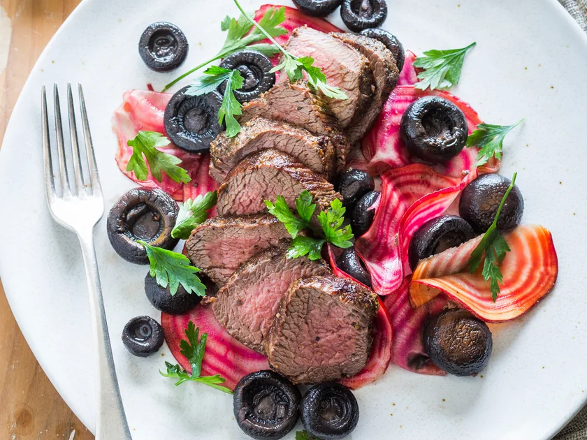 Venison with candied beets and pickled mushrooms