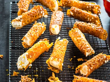 Brandy snaps with orange cream