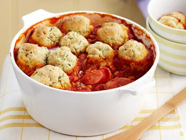 Sausage and bean hotpot with herb dumplings
